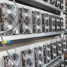 Racks of ASIC miners at a bitcoin mining hosting facility